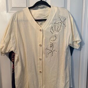 Cream Button-Up Cardigan with Embellished Seashell Design‎